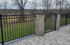Vanguard Avant E-2 Aluminum Fence in Westtown NY with Arch Gate in Pillars
